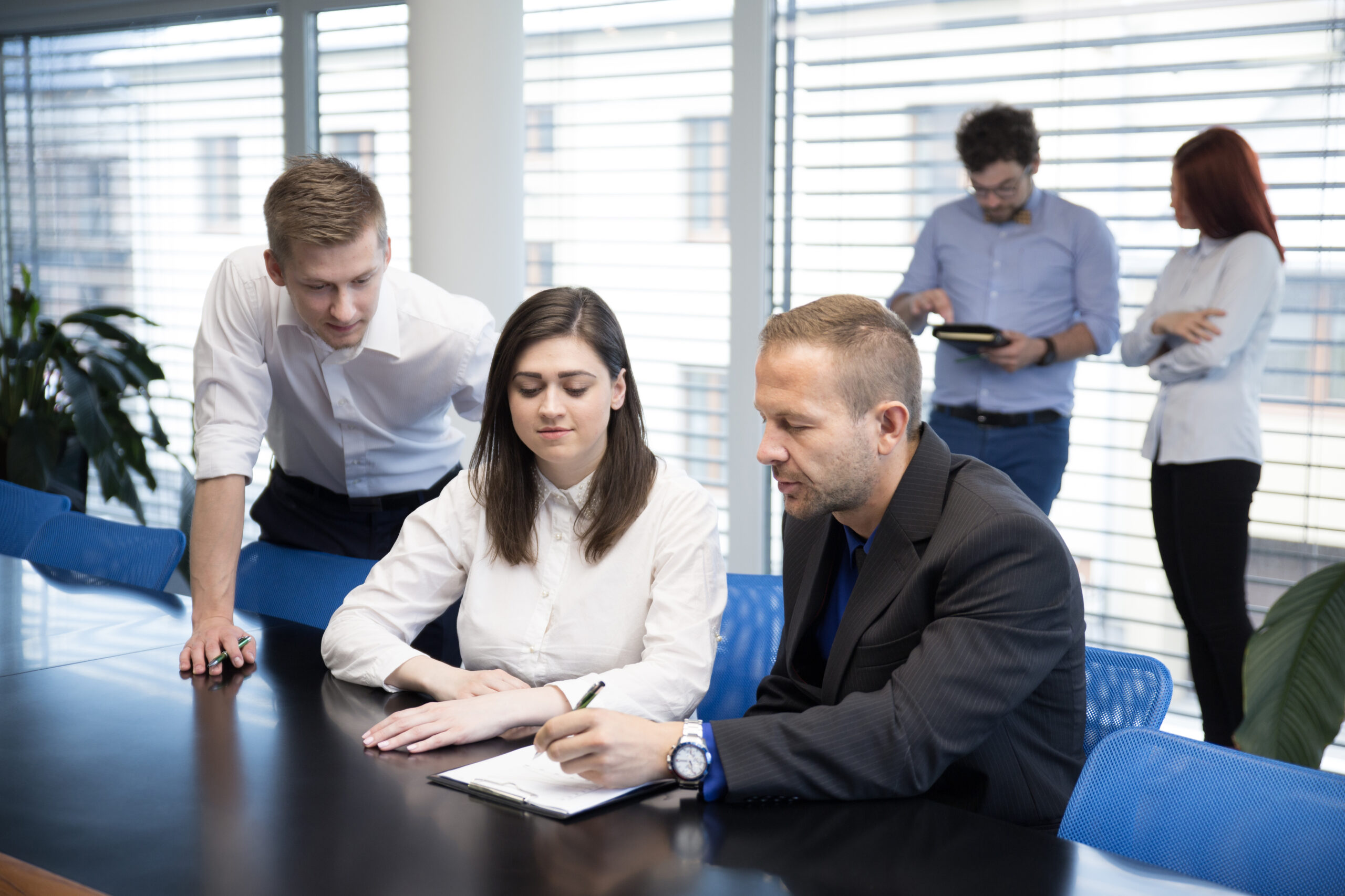 people collaborating new plan scaled 1
